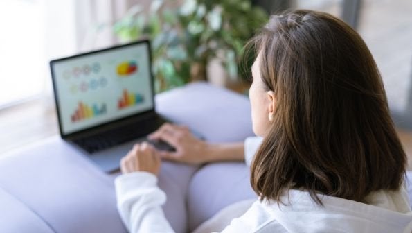 internet speed test, why speed test results vary, woman on laptop looking at charts and graphs